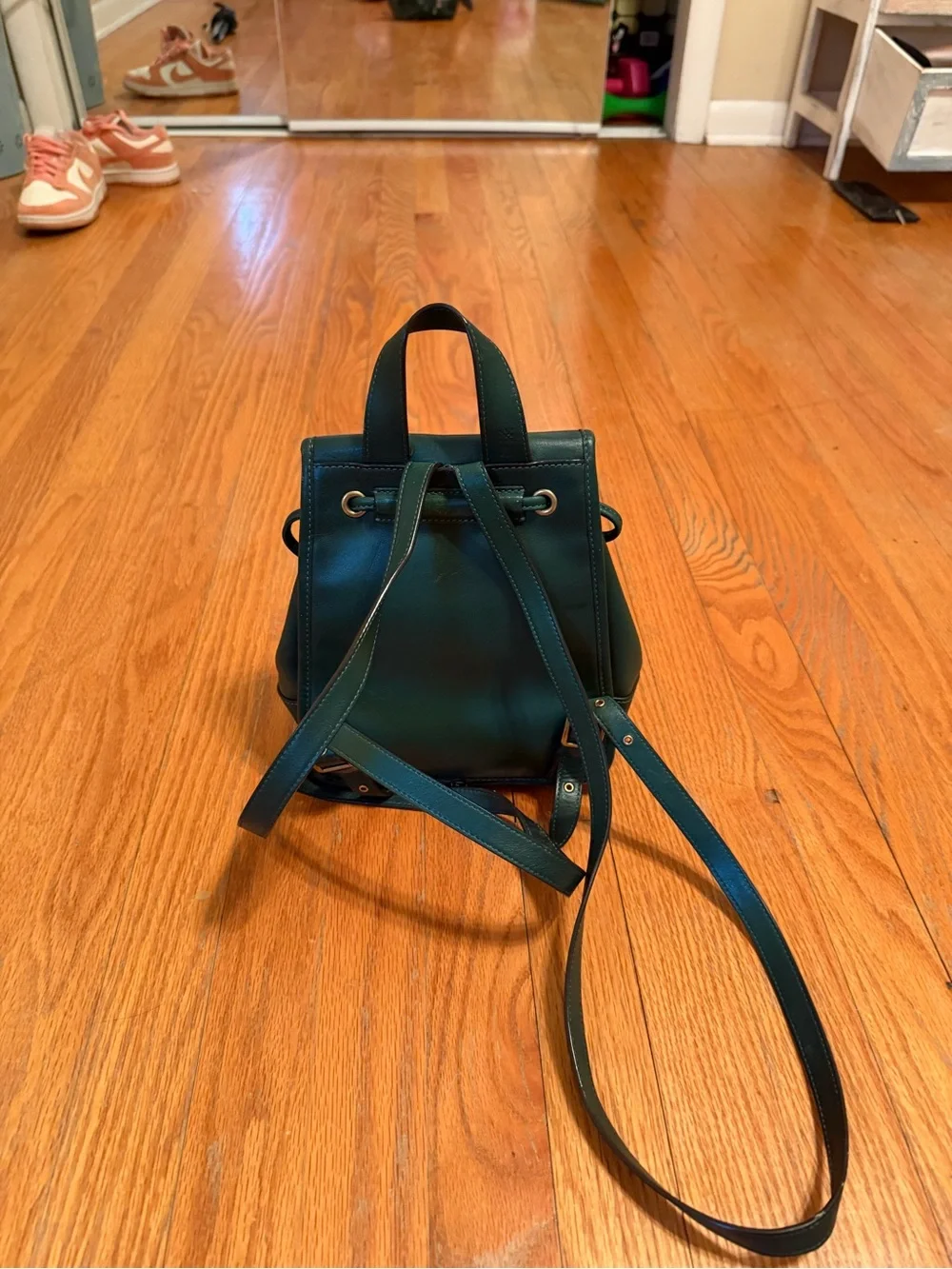 GREEN COACH TURNLOCK BACKPACK- GLOVETANNED LEATHER W HARDWARE